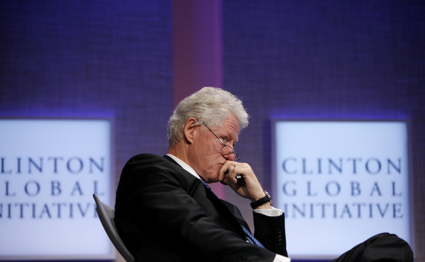 September 2008, New York, N.Y. - Former President Bill Clinton looks on during the opening plenary of the Clinton Global Initiative annual meeting. : News Singles : Jason DeCrow Photojournalist