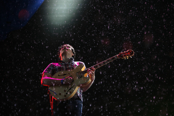 July 2009, Jersey City, N.J. - Lead singer Ezra Koenig performs with Vampire Weekend in a heavy downpour during the All Points West music festival at Liberty State Park. : Showbiz Singles : Jason DeCrow Photojournalist