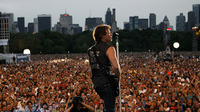 July 2008, New York, N.Y. - Jon Bon Jovi performs with Bon Jovi during a free concert celebrating Major League Baseball All-Star Summer on Central Park's Great Lawn.