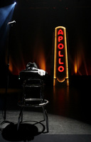 June 2009, New York, N.Y. - A hat, glove and sunglasses similar to those often worn by Michael Jackson sit atop a stool onstage during a tribute to the late singer at Harlem's Apollo Theater.