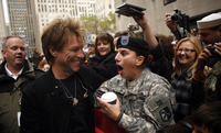 November 2009, New York, N.Y. - Jon Bon Jovi embraces U.S. Army Specialist Cindy Paulo after performing on NBC's "Today" in Rockefeller Center.