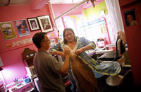 Fierstein dons one of his costumes.