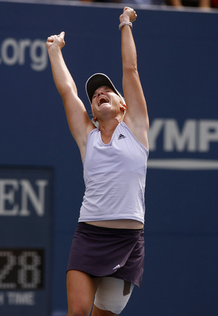 September 2009, Flushing, N.Y. - Melanie Oudin, of Marietta, Ga., celebrates after upsetting Russia's Nadia Petrova during the fourth round of the US Open at the USTA Billie Jean King National Tennis Center. : Sports Singles : Jason DeCrow Photojournalist