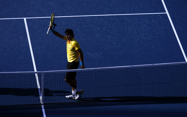 September 2009, Flushing, N.Y. - Spain's Rafael Nadal waves to the crowd as he leaves the court after defeating Richard Gasquet, of France, during the first round of the US Open at the USTA Billie Jean King National Tennis Center. : Sports Singles : Jason DeCrow Photojournalist
