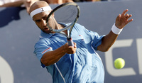 September 2009, Flushing, N.Y. - James Blake, of the United States, hits a forehand against Spain's Ruben Ramirez Hidalgo during the first round of the US Open at the Billie Jean King USTA National Tennis Center.