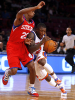 October 2009, New York, N.Y. - New York Knicks #2 Nate Robinson, right, drives against Philadelphia 76ers #23 Louis Williams during a preseason NBA basketball game at Madison Square Garden.