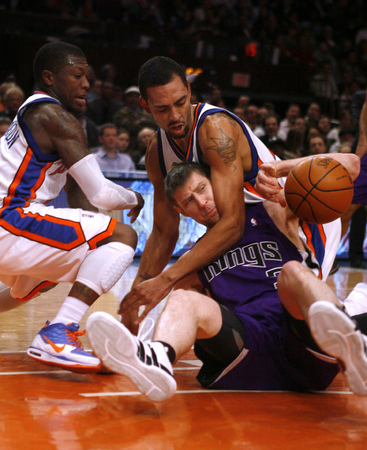 February 2010, New York, N.Y. - New York Knicks #2 Nate Robinson, left, and #20 Jared Jeffries fight for possession with Sacramento Kings #5 Andres Nocioni during an NBA basketball game at Madison Square Garden. : Sports Singles : Jason DeCrow Photojournalist