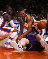 February 2010, New York, N.Y. - New York Knicks #2 Nate Robinson, left, and #20 Jared Jeffries fight for possession with Sacramento Kings #5 Andres Nocioni during an NBA basketball game at Madison Square Garden.