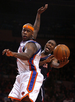 March 2010, New York, N.Y. - New York Knicks #7 Al Harrington, left, defends Atlanta Hawks #11 Jamal Crawford as he tries to shoot during an NBA basketball game at Madison Square Garden.