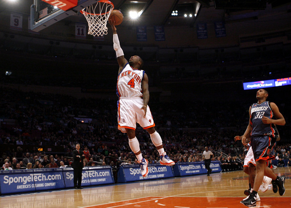 March 2010, New York, N.Y. - New York Knicks #4 Nate Robinson, left, goes to the basket ahead of Charlotte Bobcats #32 Boris Diaw during an NBA basketball game at Madison Square Garden. : Sports Singles : Jason DeCrow Photojournalist