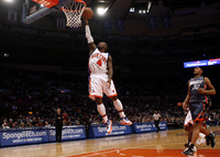 March 2010, New York, N.Y. - New York Knicks #4 Nate Robinson, left, goes to the basket ahead of Charlotte Bobcats #32 Boris Diaw during an NBA basketball game at Madison Square Garden.