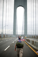November 2009, Staten Island, N.Y. - A runner crosses the Verrazano Narrows Bridge at the start of the ING New York City Marathon. 