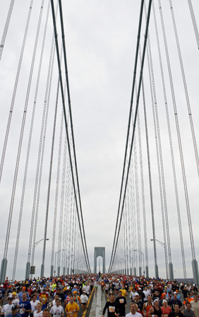 November 2009, Staten Island, N.Y. - Runners cross the Verrazano Narrows Bridge at the start of the ING New York City Marathon. : Sports Singles : Jason DeCrow Photojournalist