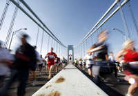 November 2007, Staten Island, N.Y. - Runners cross the Verrazano Narrows Bridge at the start of the ING New York City Marathon.