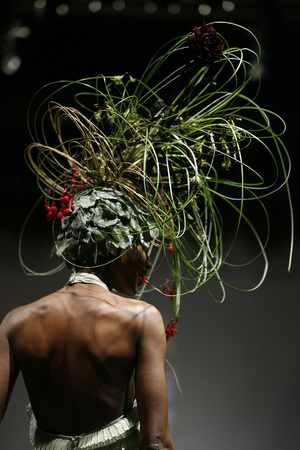 May 2009, New York, N.Y. - An elaborate floral headdress is modeled during the 8th annual Tulips and Pansies fashion show. : Showbiz Singles : Jason DeCrow Photojournalist