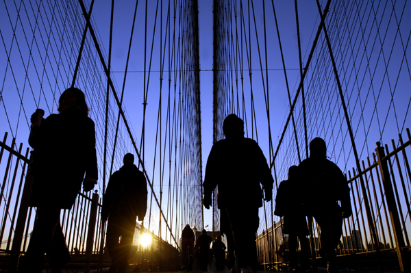 December 2005, New York, N.Y. - Commuters brave the cold as they make their way across the Brooklyn Bridge at daybreak during a crippling transit strike that left an estimated 7 million riders stranded. : News Singles : Jason DeCrow Photojournalist