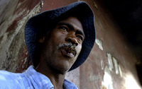"I pray to God Preval will be elected," says Carlos, an unemployed fisherman.