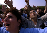 June 2005, NYC -Lively gospel music  works evangelicals into a fervor before the Reverend Billy Graham's sermon on the final day of his Greater New York Crusade in Flushing Meadows. - © All images copyright Jason DeCrow