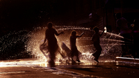 July 2005, Bronx, N.Y. - An open hydrant at sunset provides relief after a steamy summer day in the South Bronx.