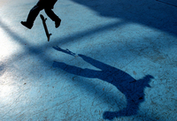 June 2005, Flushing, N.Y. - A skateboarder kickflips through the shadows of the Unisphere in Flushing Meadows.