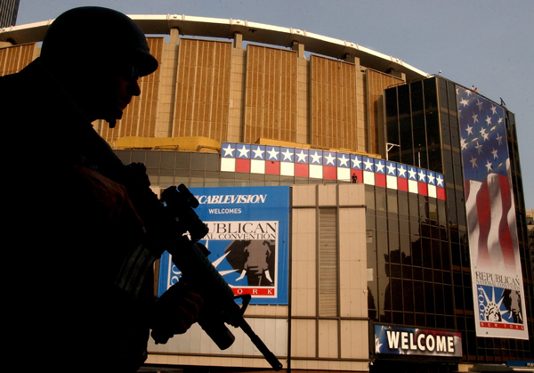 August 2004, New York, N.Y. - A member of the NYPD's elite Hercules unit patrols the steps of the Farley Post Office across from Madison Square Garden before the Republican National Convention. : News Singles : Jason DeCrow Photojournalist