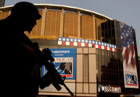 August 2004, New York, N.Y. - A member of the NYPD's elite Hercules unit patrols the steps of the Farley Post Office across from Madison Square Garden before the Republican National Convention.