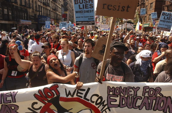 August 29, one day out - Anti-Bush demonstrators shout their way up Seventh Avenue towards Madison Square Garden during the massive United For Peace and Justice Rally. : GOP in NYC 2004 : Jason DeCrow Photojournalist