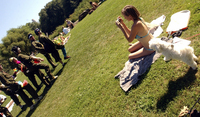 August 29, one day out - Members of an anti-Bush performance group attract attention as they march in military flight suits across The Great Lawn in Central Park. - © All images copyright Jason DeCrow