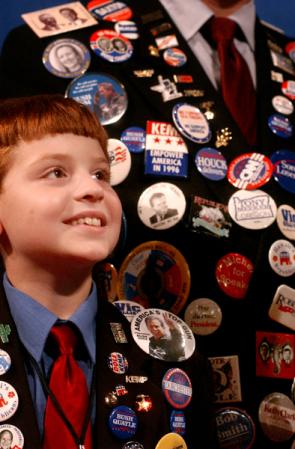 August 30, day one - A young Republican stands with his father as they listen to former New York City Mayor Rudolph Giuliani. : GOP in NYC 2004 : Jason DeCrow Photojournalist