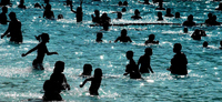 July 2003, NYC - Crystal waters provide much needed relief from the fourth day of a summer heat wave at Astoria Pool in Astoria. - © All images copyright Jason DeCrow